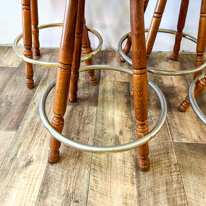 Brown Captains Mate timber swivel barstool with metal ring footrest