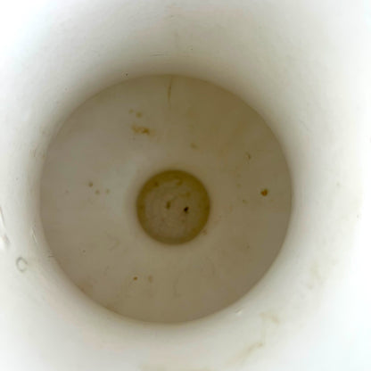 White ceramic urn shape vase