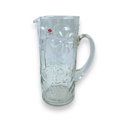 Pressed flower pattern clear glass pitcher
