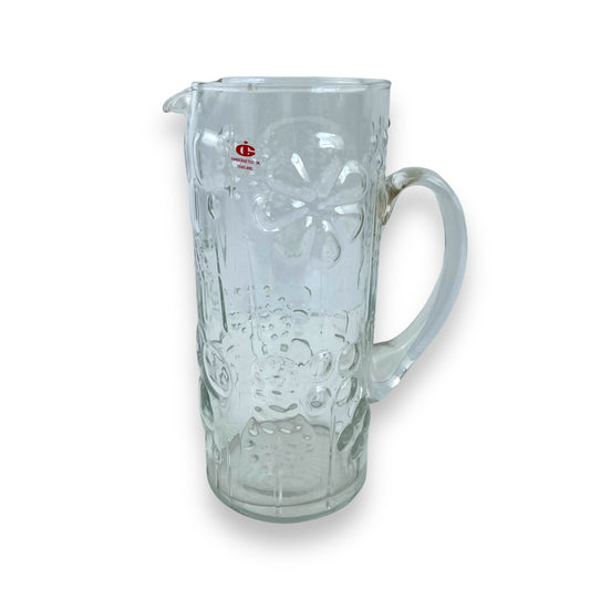 Pressed flower pattern clear glass pitcher
