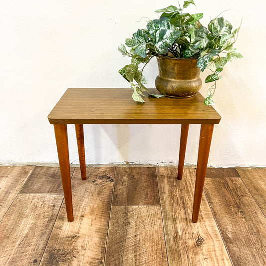 Small brown laminate side table