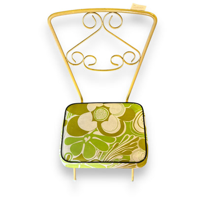 Yellow and green flower metal swirl chair