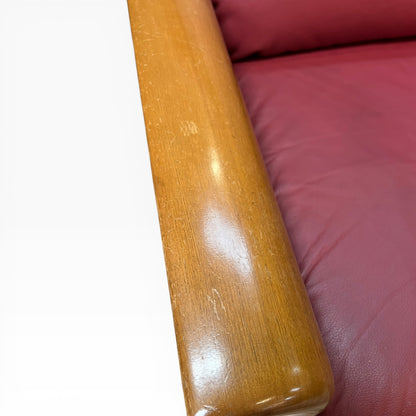 Two Seater Lounge with Sculpted Curved Timber Armrests & Burgundy Leather Cushions