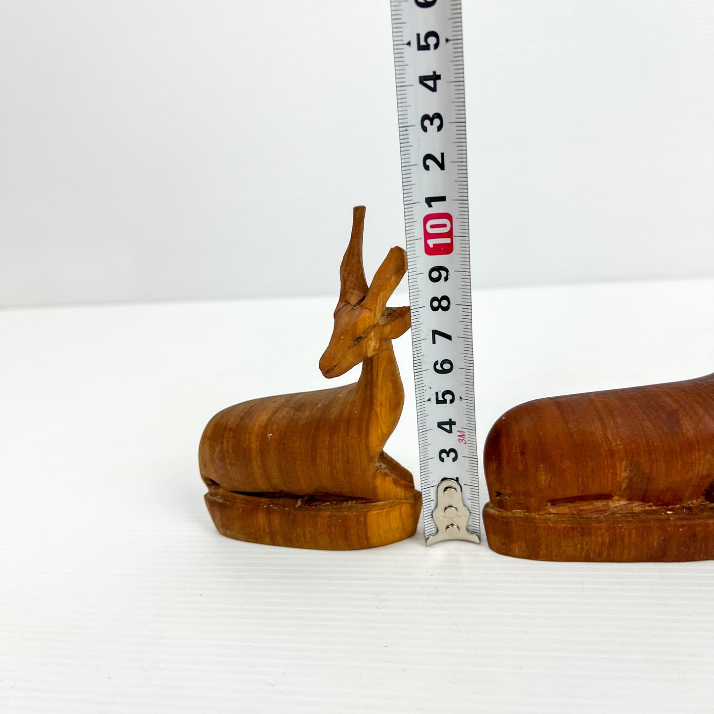 Carved Wooden Laying Antelope Statue Pair