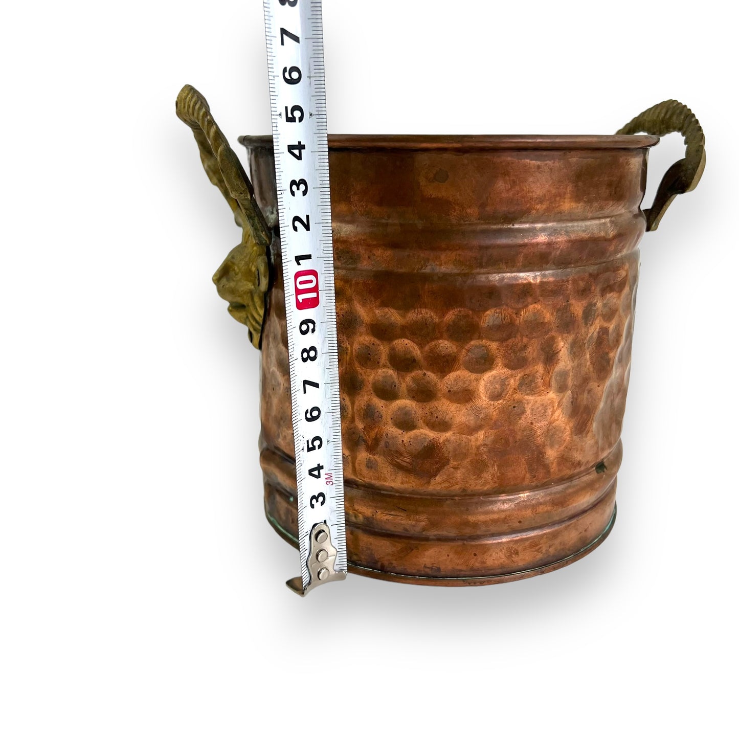Brass and copper lion head plant pot
