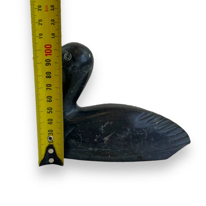 Stone carved duck statue