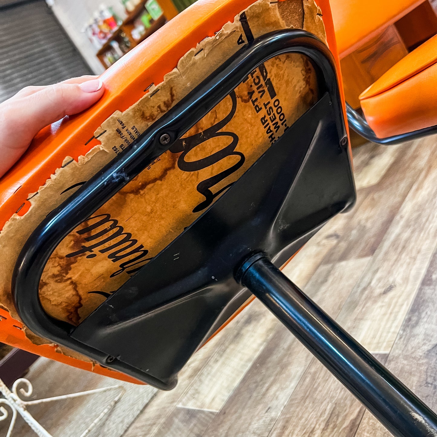 Pair of Vintage Swivel Chairs – Orange Vinyl & Black Star Base