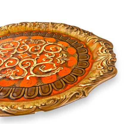 Large orange and brown ornate ceramic serving platter