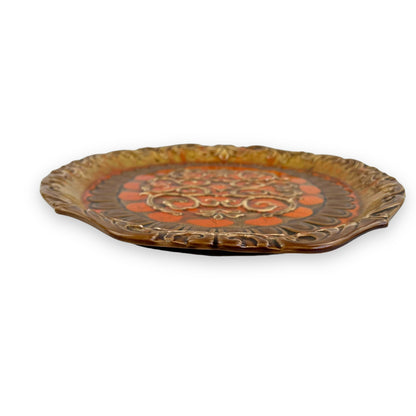 Large orange and brown ornate ceramic serving platter