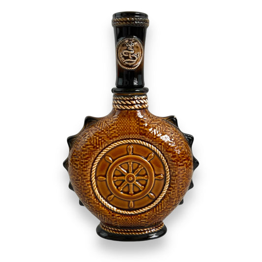 Brown Ceramic Decanter with Ship and wheel design.