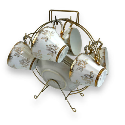 Vintage Japan Tea Cup and Saucer Set with Gold Accents and Floral Design on Brass Rack - 11 piece set