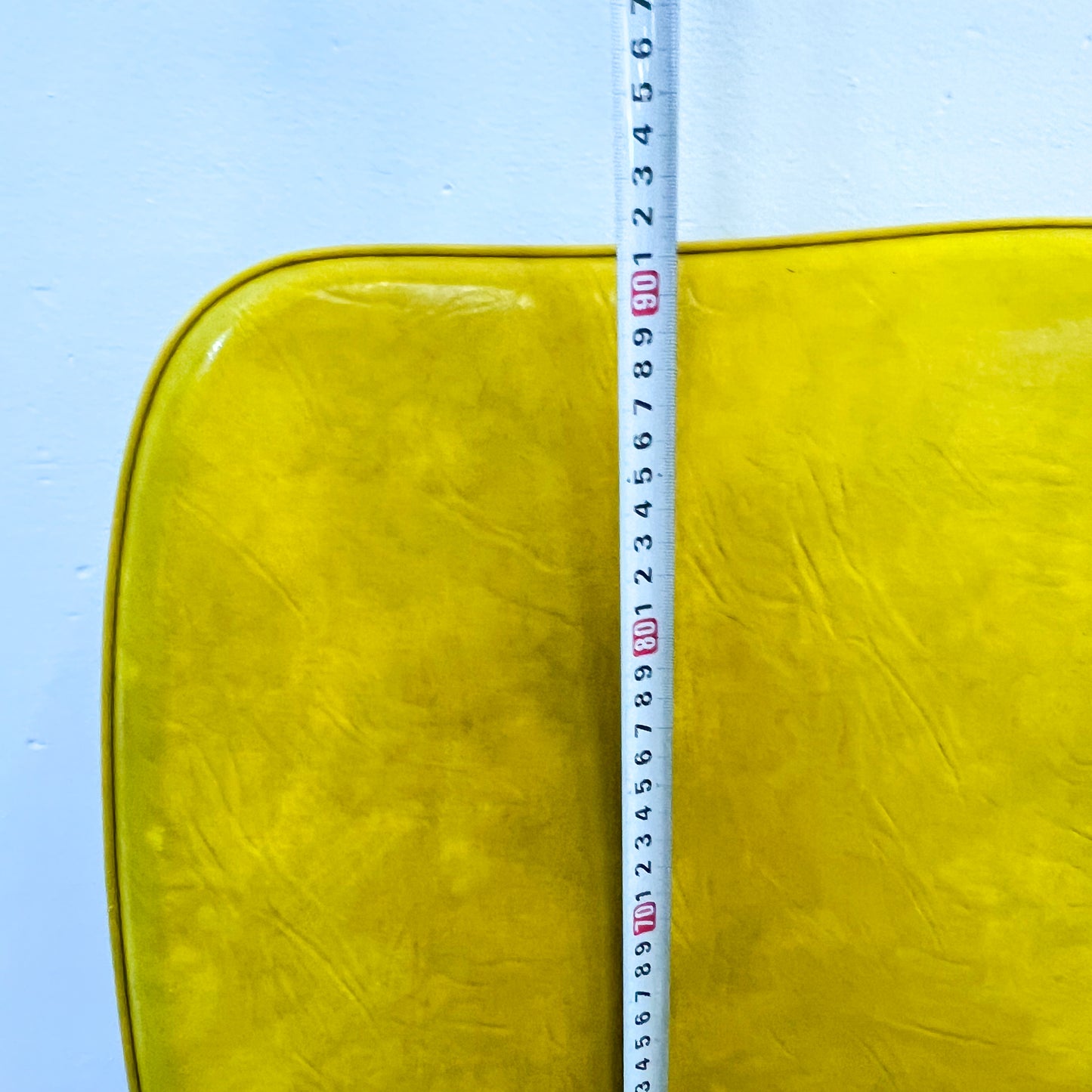 Retro yellow swivel dining chair