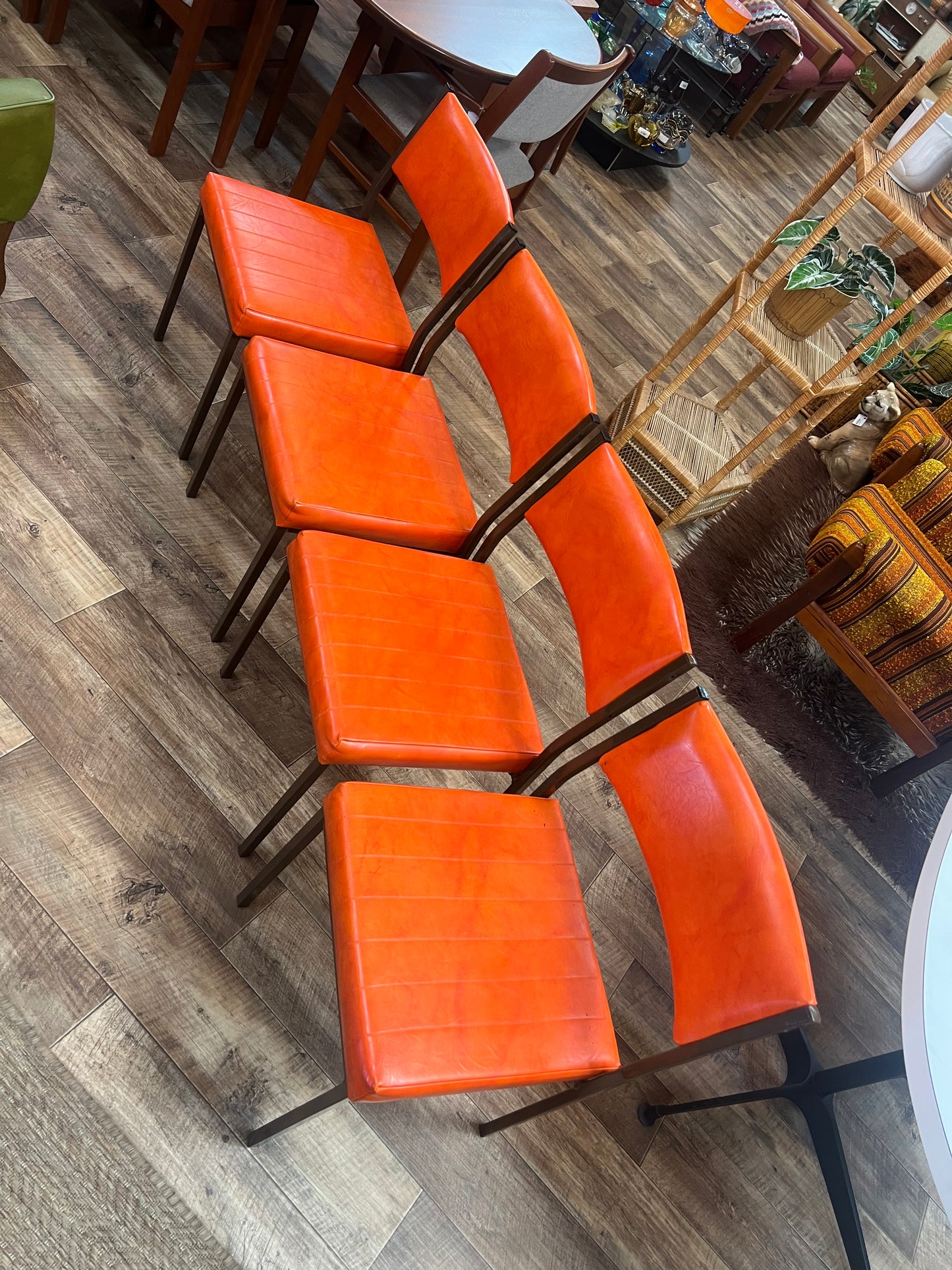 Set of 4 Mid Century Bright Orange Vinyl Dining Chairs with Dark Brown Steel Frames