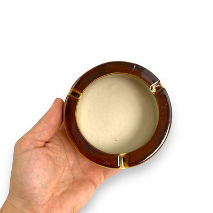 Brown and beige ceramic round ashtray