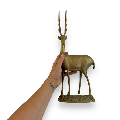 Large brass antelope statue