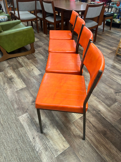 Set of 4 Mid Century Bright Orange Vinyl Dining Chairs with Dark Brown Steel Frames