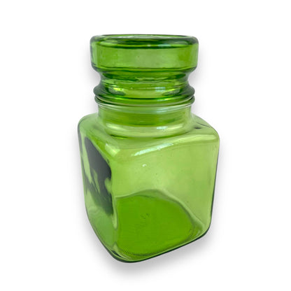 Green glass jar with suction lid