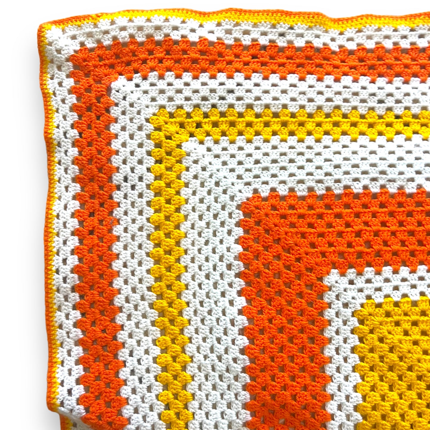 Orange, yellow and white crochet knit blanket