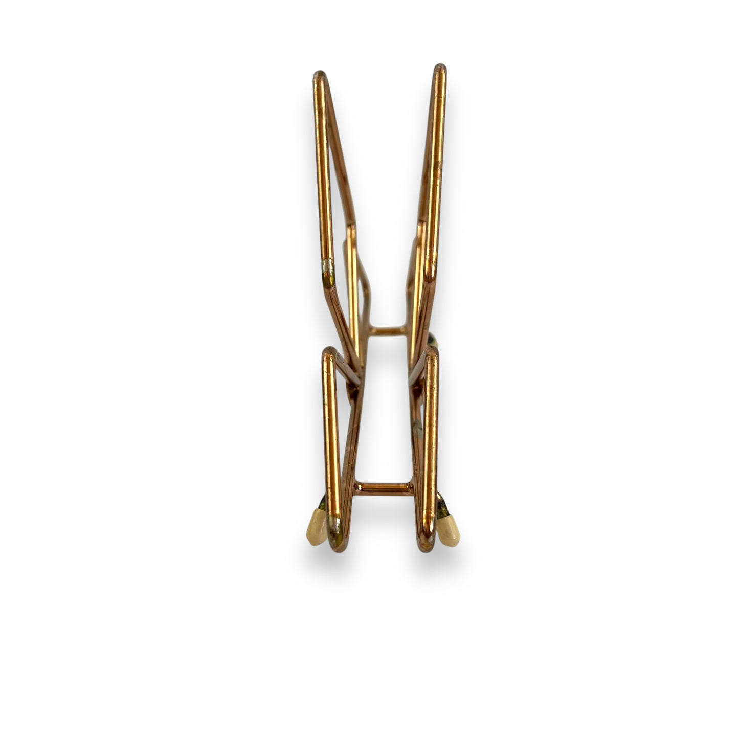Copper coloured triangle design letter / napkin holder