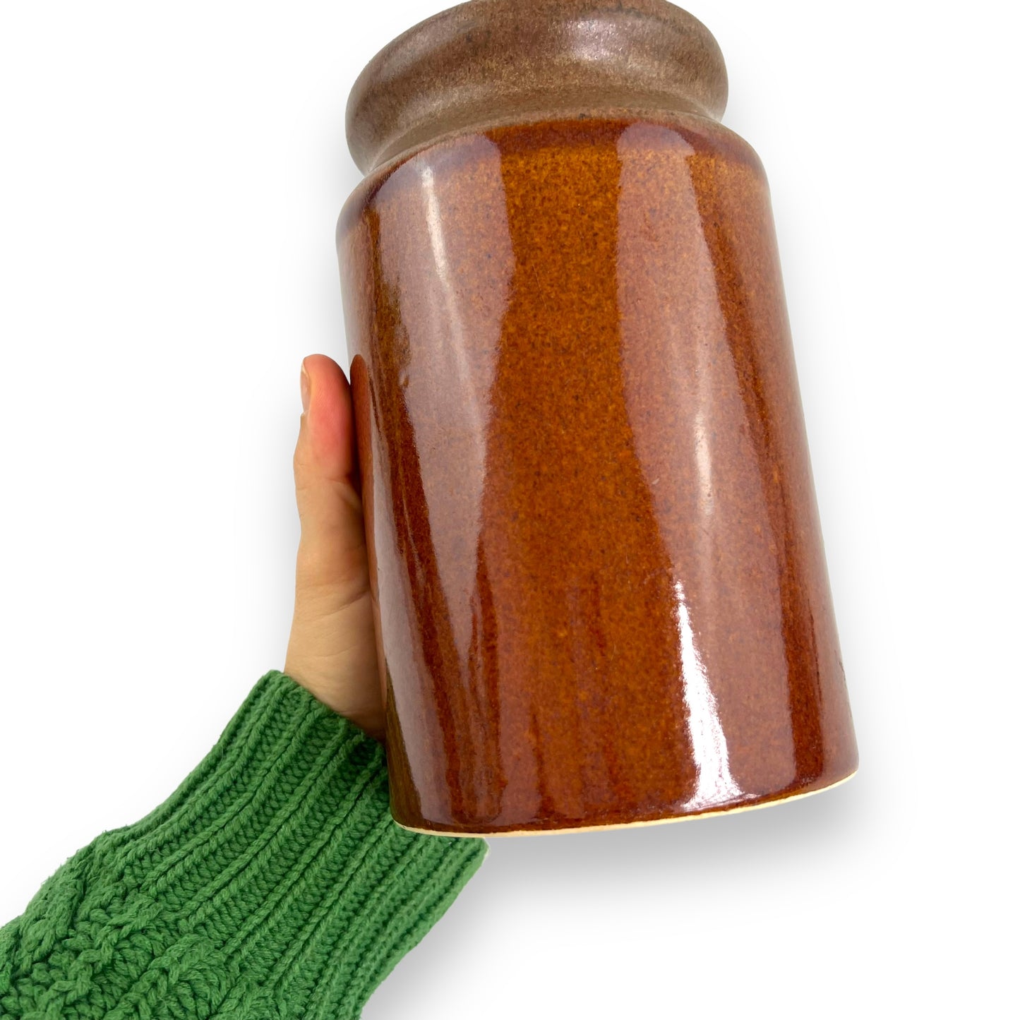 Brown pottery jar with cork lid