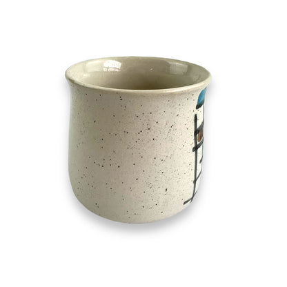Brown and blue plaid pattern ceramic mug