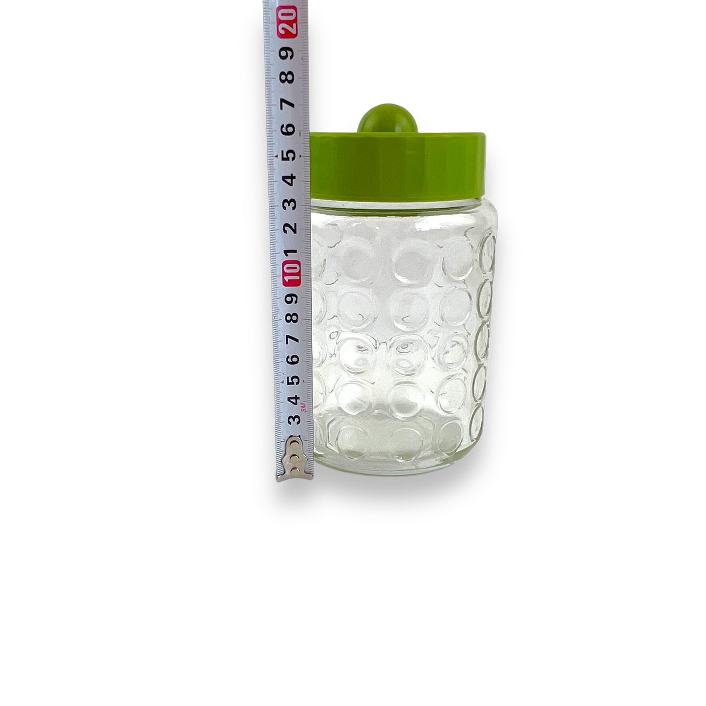 Green lid circle clear glass pattern jar