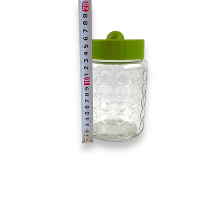 Green lid circle clear glass pattern jar