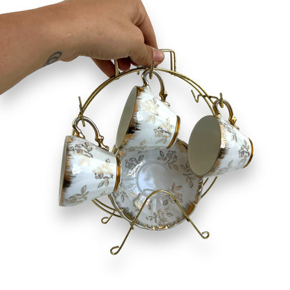 Vintage Japan Tea Cup and Saucer Set with Gold Accents and Floral Design on Brass Rack - 11 piece set