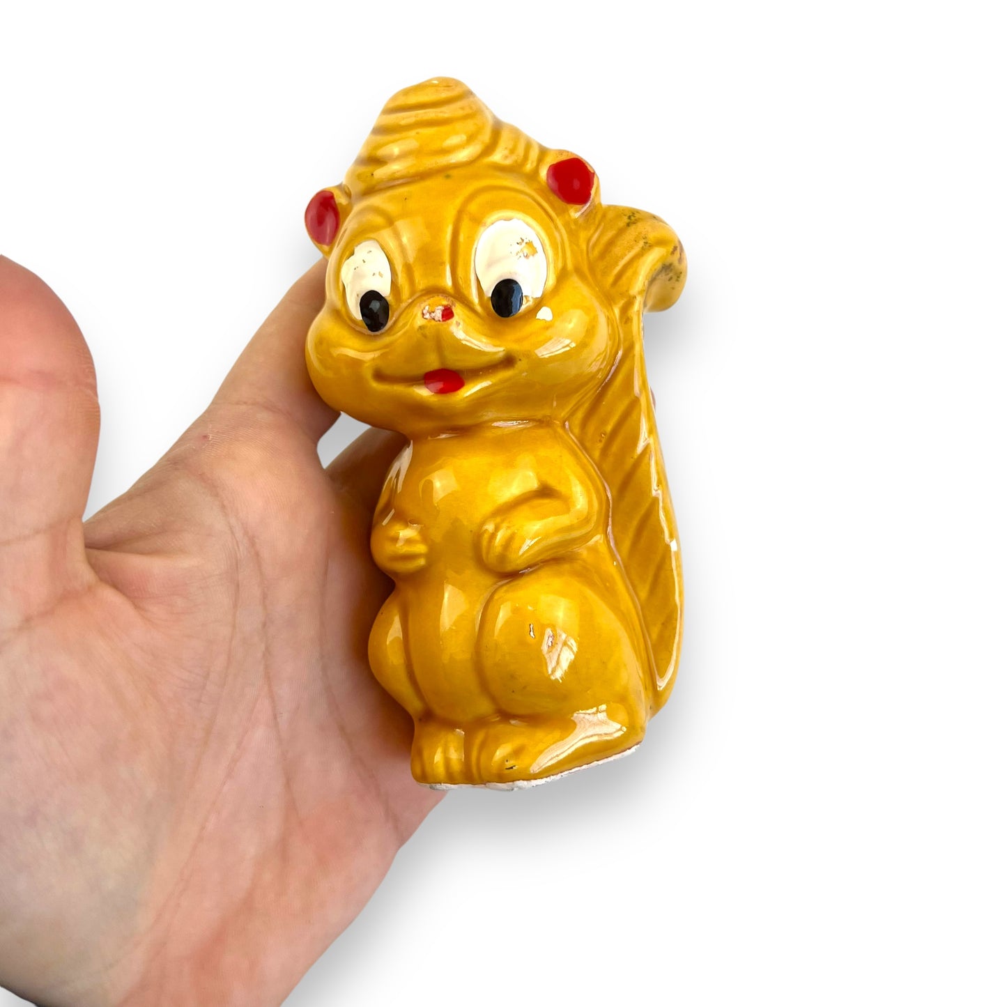 Retro yellow squirrel statue