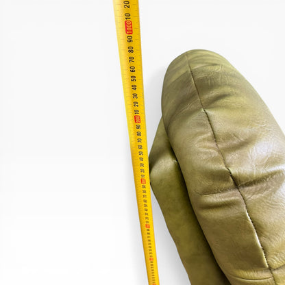Olive Green Vinyl Lounge Armchair with Timber Sleigh Base
 (rip on side)