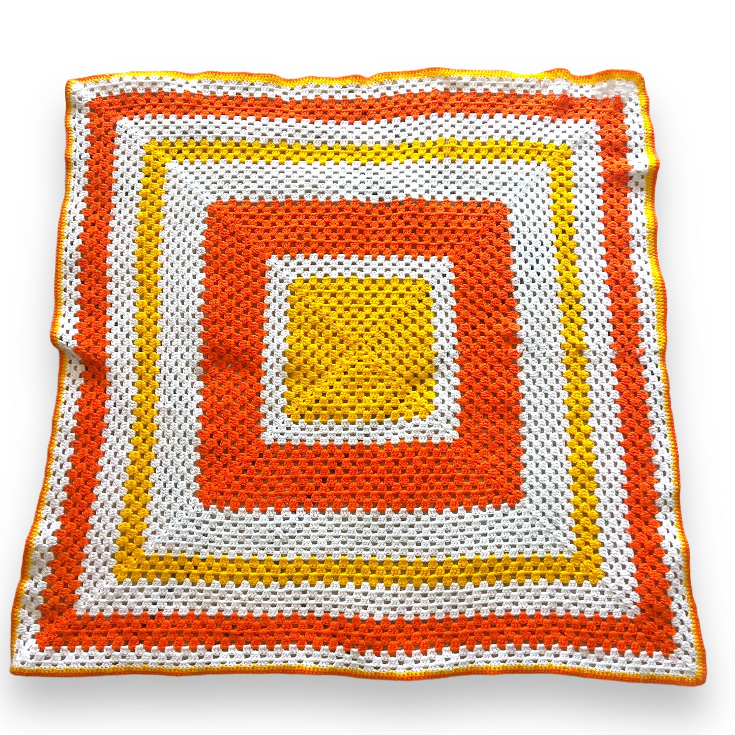 Orange, yellow and white crochet knit blanket