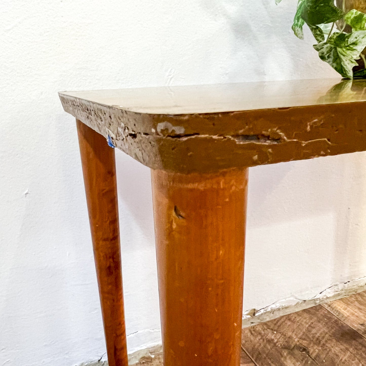 Small brown laminate side table