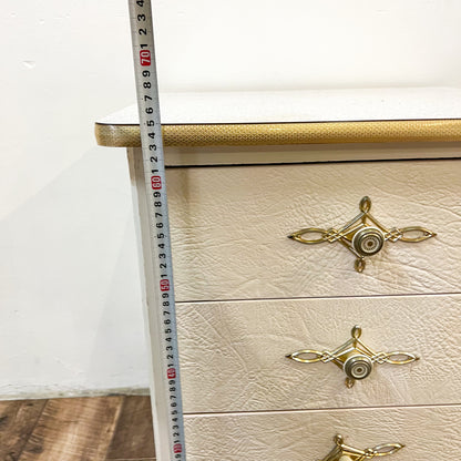 White & gold bedside table