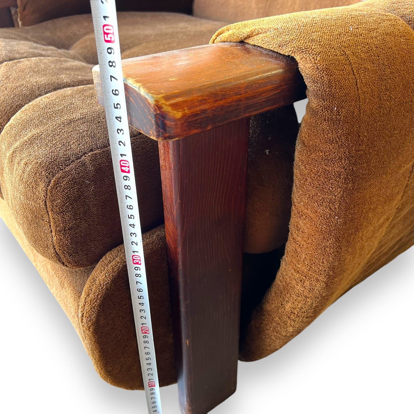Brown Lounge Chair with Wooden Armrests