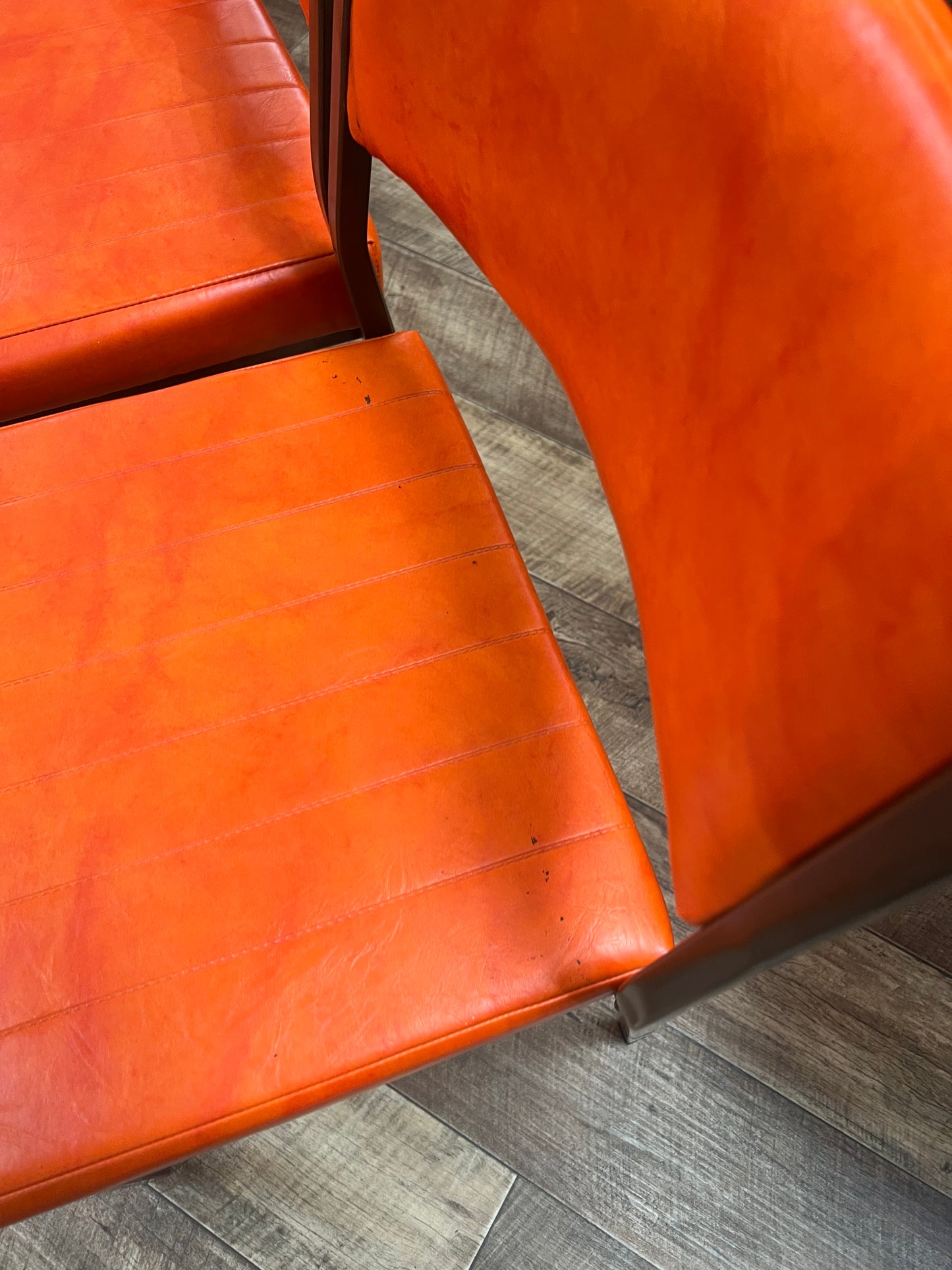 Set of 4 Mid Century Bright Orange Vinyl Dining Chairs with Dark Brown Steel Frames