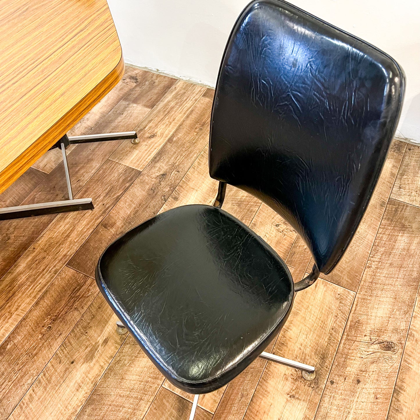 Brown Laminate Octagon Dining Table and 4 Black swivel dining chairs