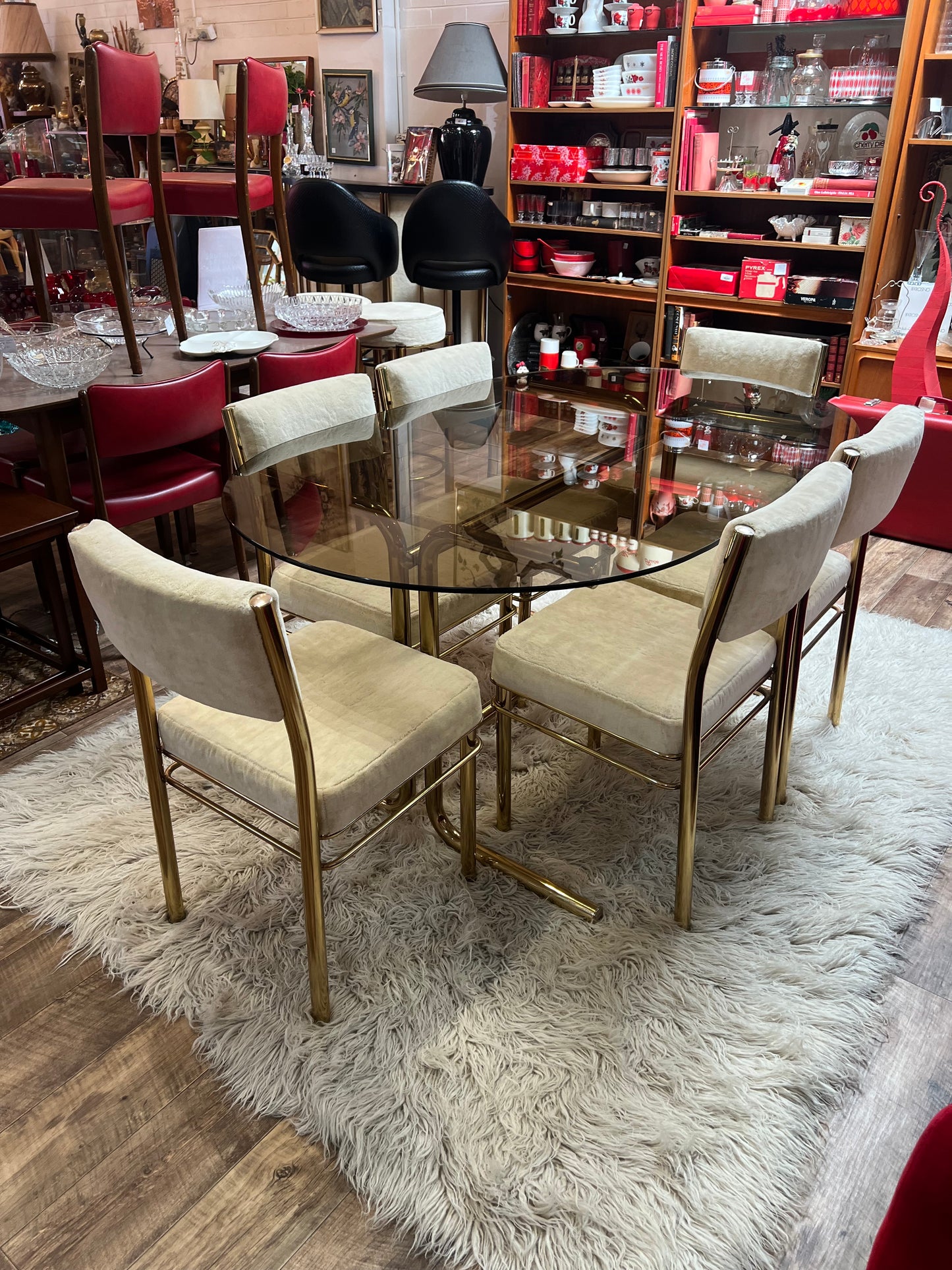 Brass & Smoked Glass Dining Table with 6 Chairs cream upholstery