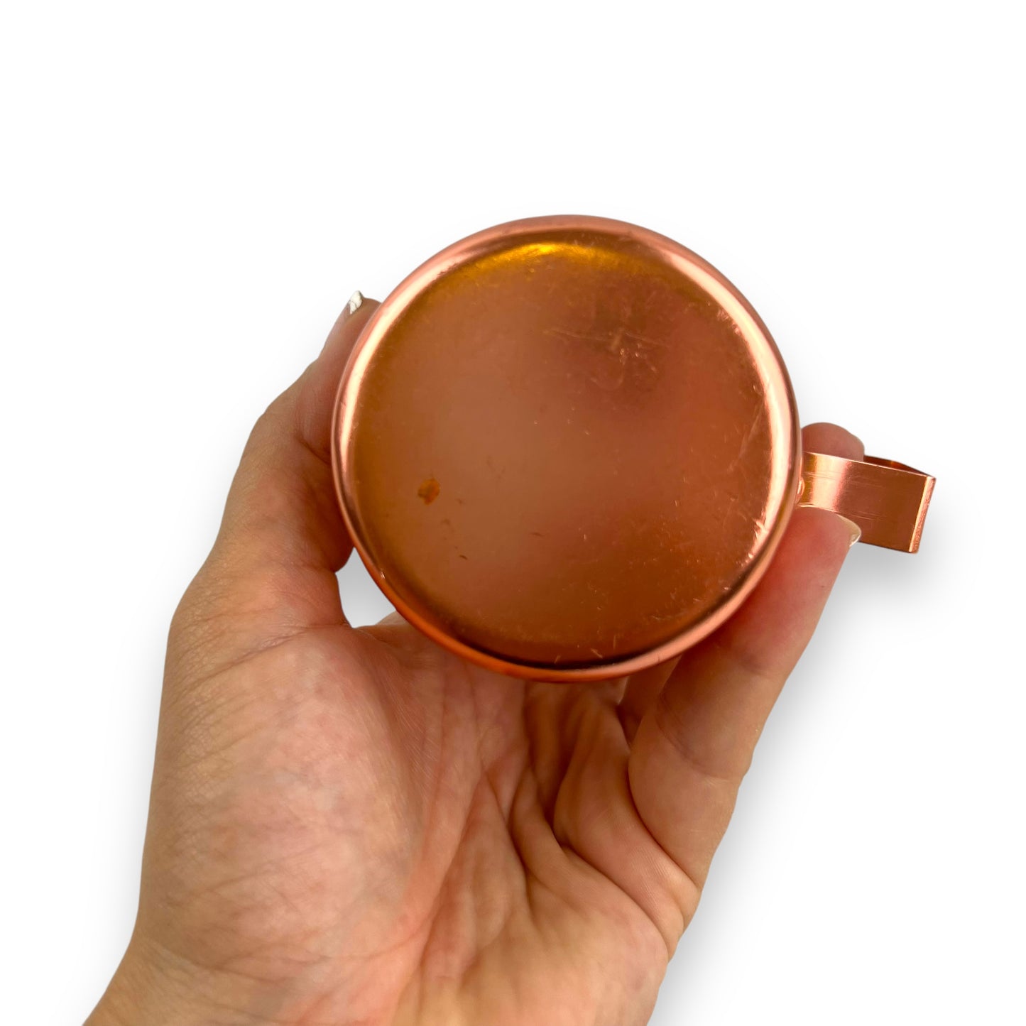 Rose gold coloured metal condiment shaker