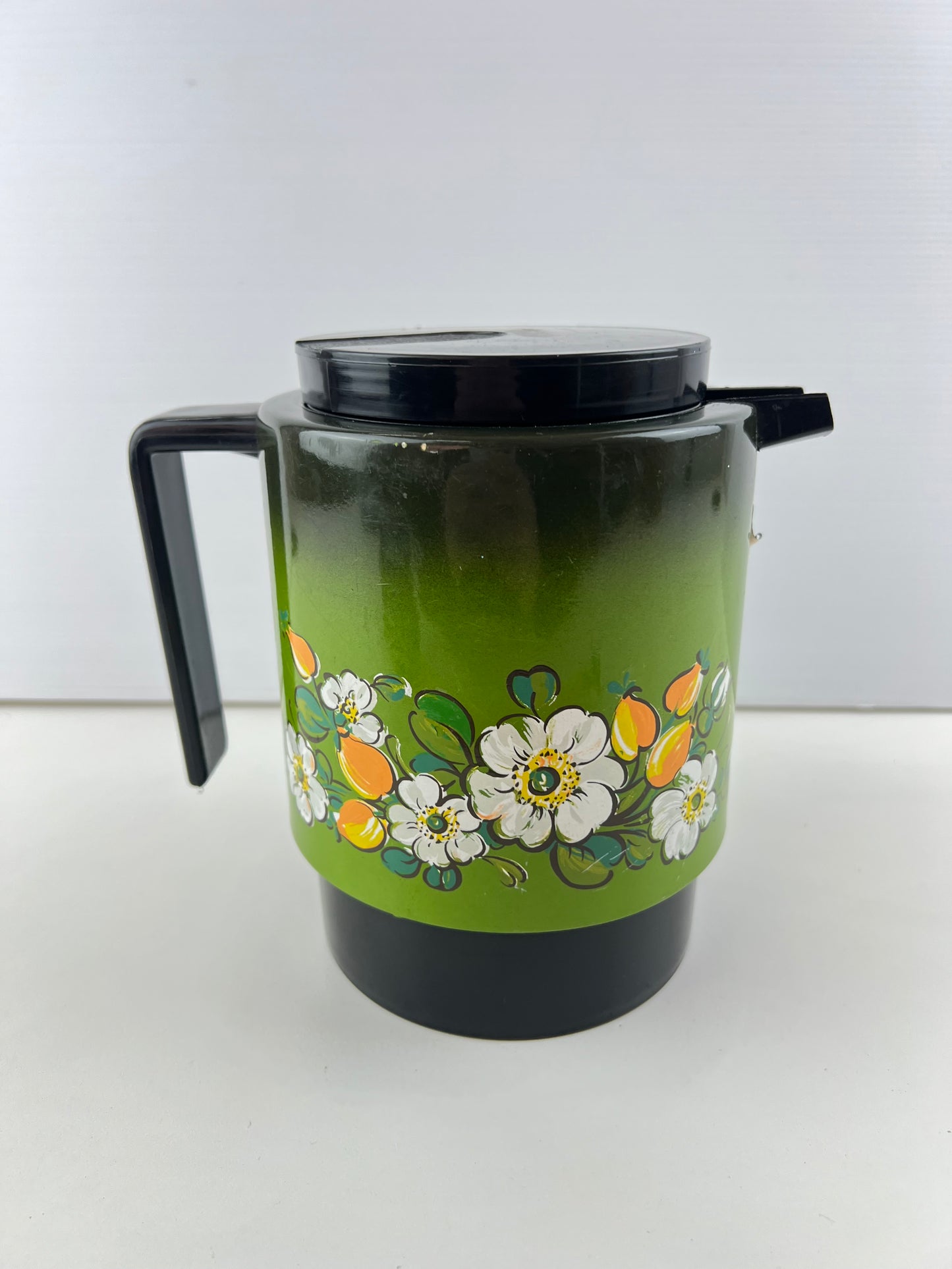 Insulated Thermos 
Green flower jug