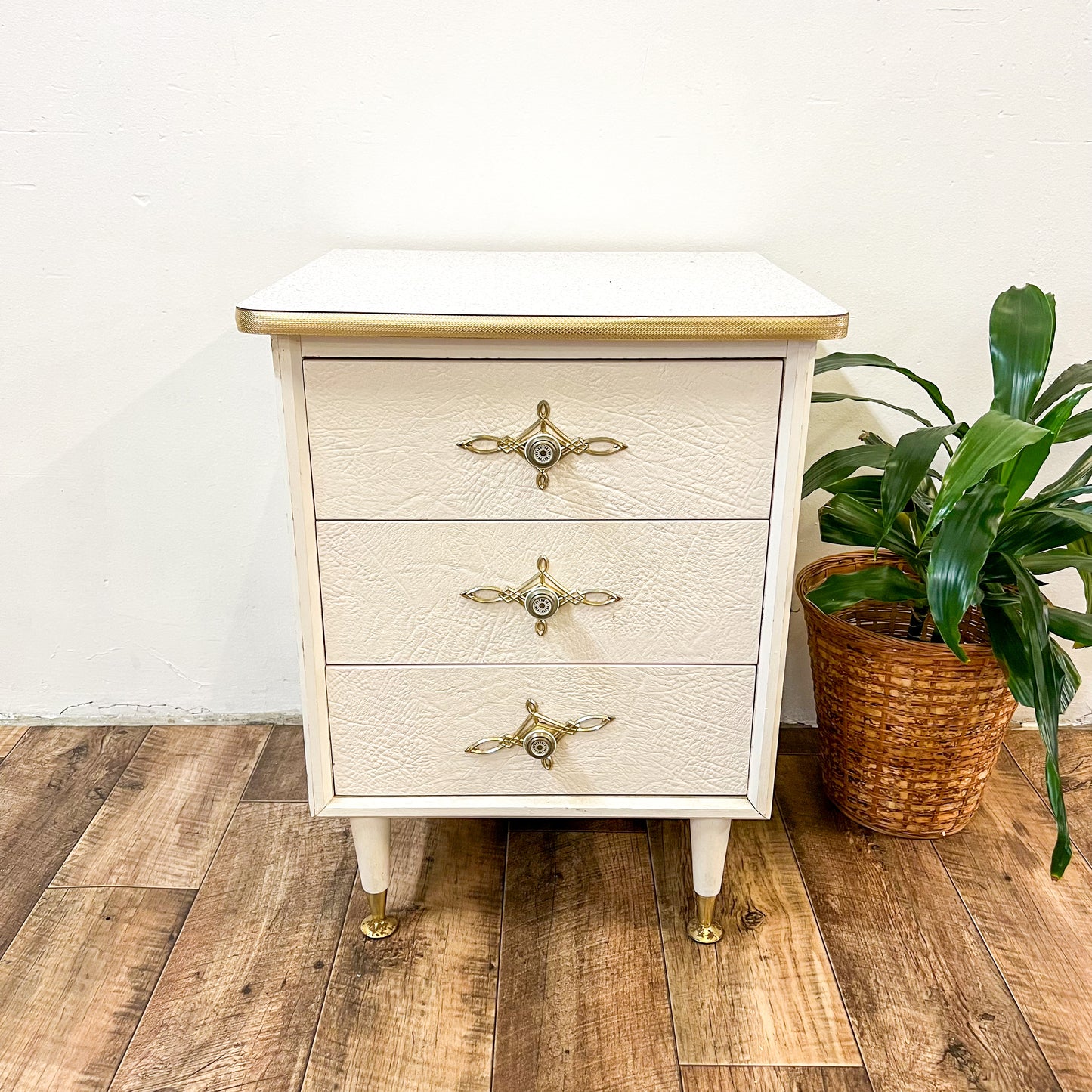 White & gold bedside table