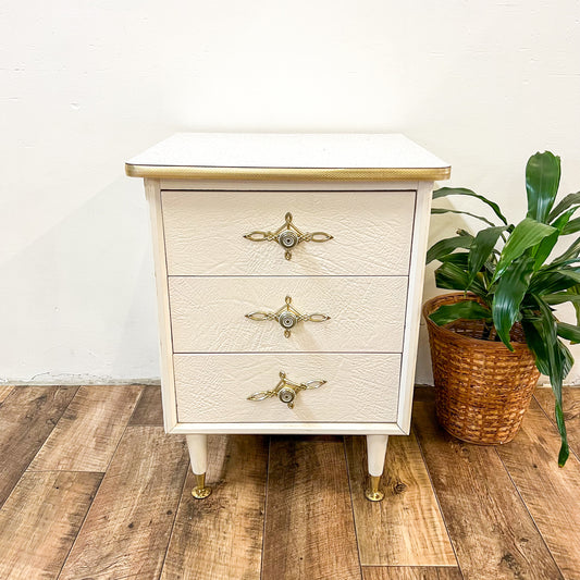 White & gold bedside table