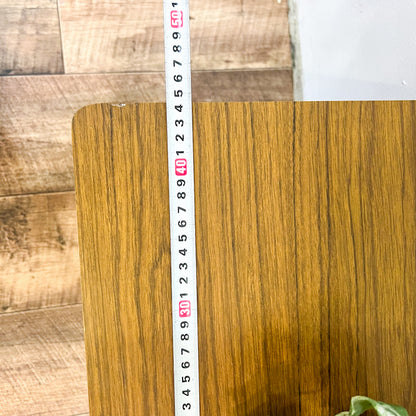 Small brown laminate side table