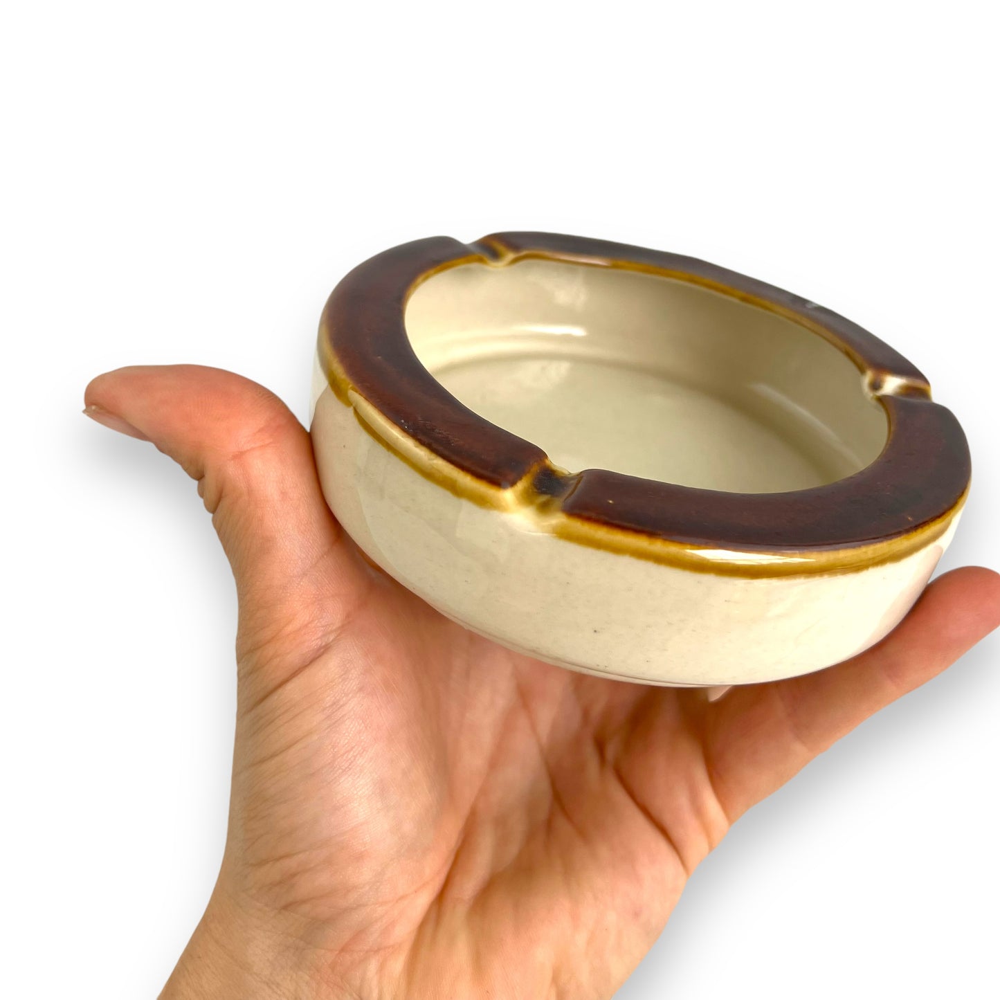 Brown and beige ceramic round ashtray