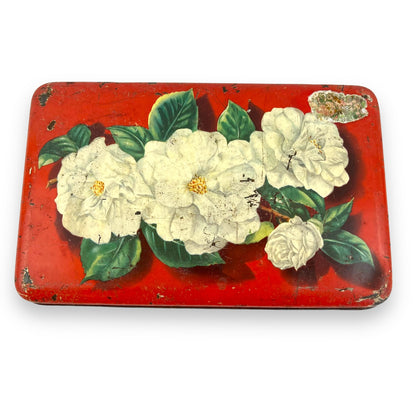 White roses red old tin
