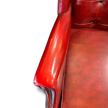 Red Wingback Armchair with Stud Detailing