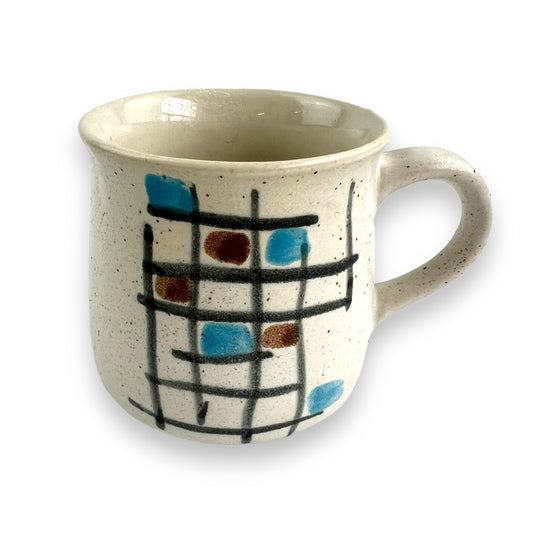 Brown and blue plaid pattern ceramic mug