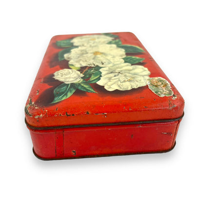 White roses red old tin