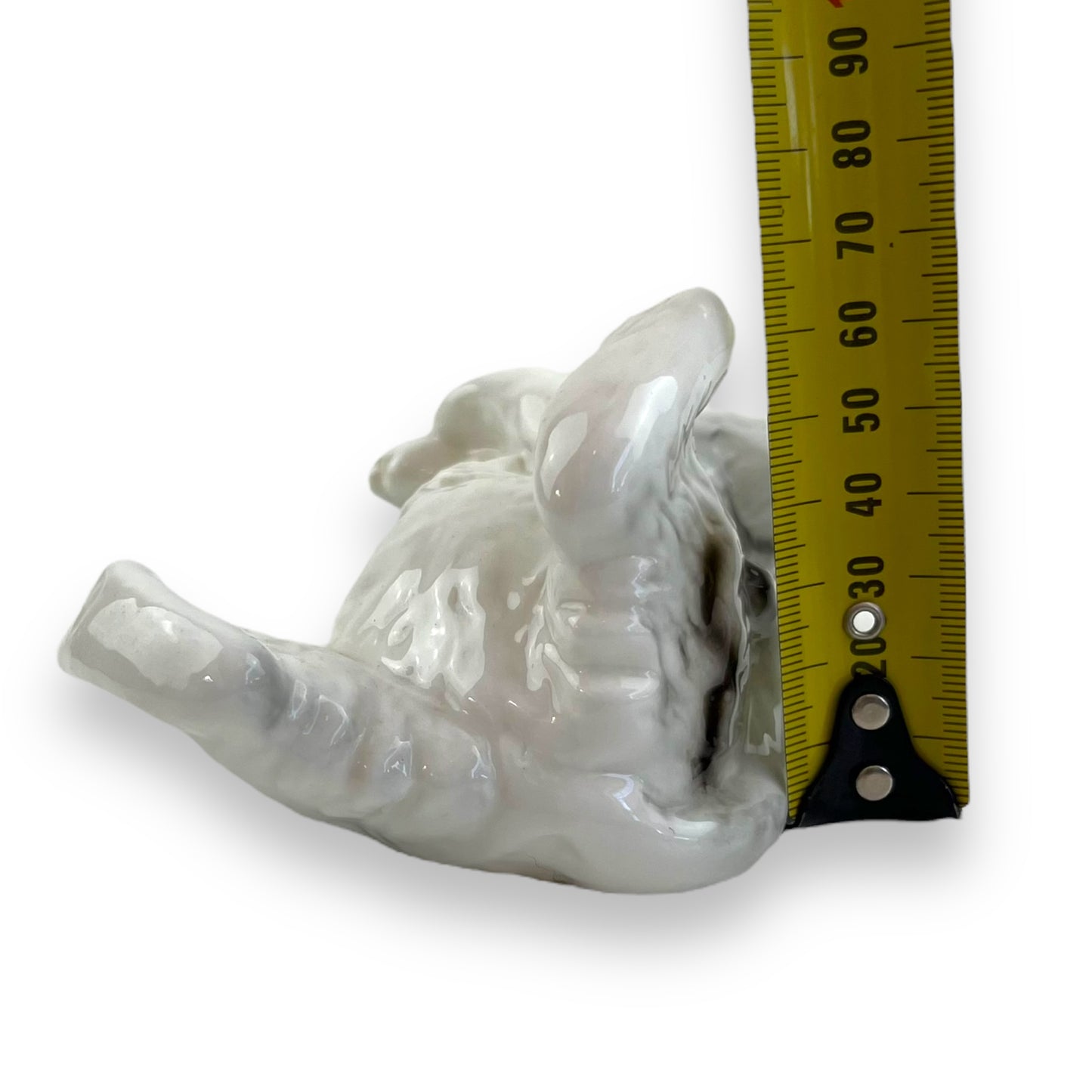 Cat laying on back ornament statue