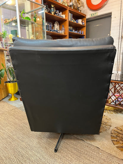 1. Mid-Century Black Leather Swivel Lounge Chair