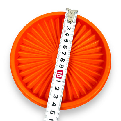 Orange Tupperware Cylinder Storage Container